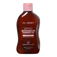 Bali Body Watermelon Tanning Oil SPF50 bottle showing travel-friendly size