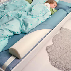 BANBALOO bed bumper between mattress and sheet for secure toddler sleep.