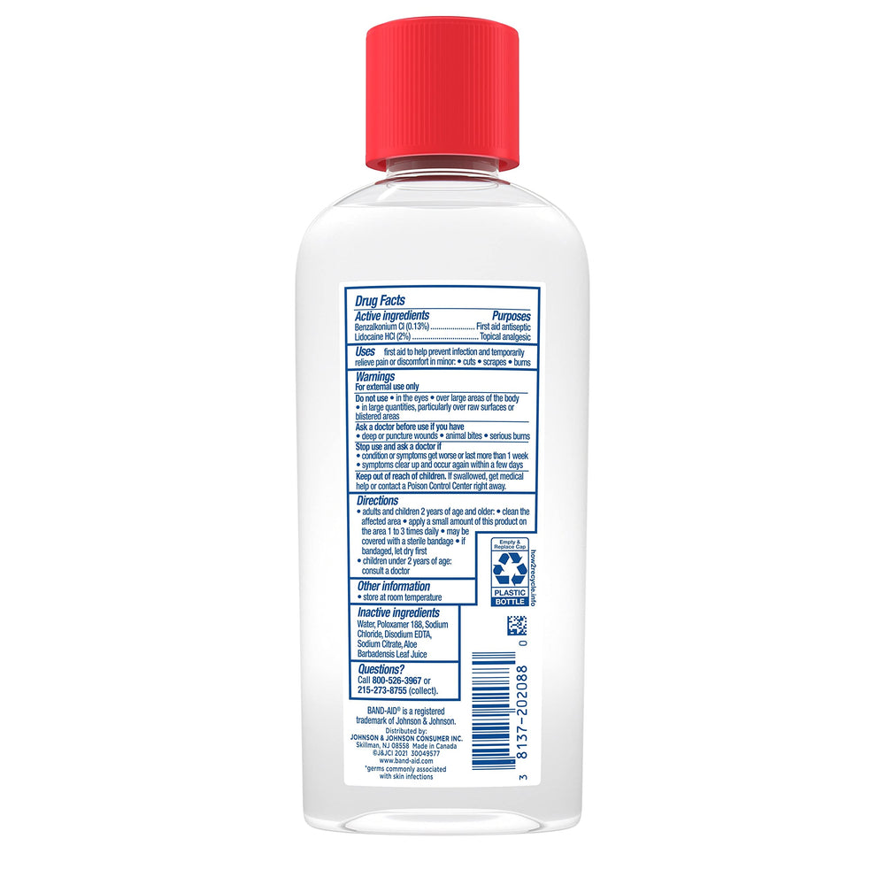 Pouring Band-Aid antiseptic cleansing liquid onto a wound for cleaning.