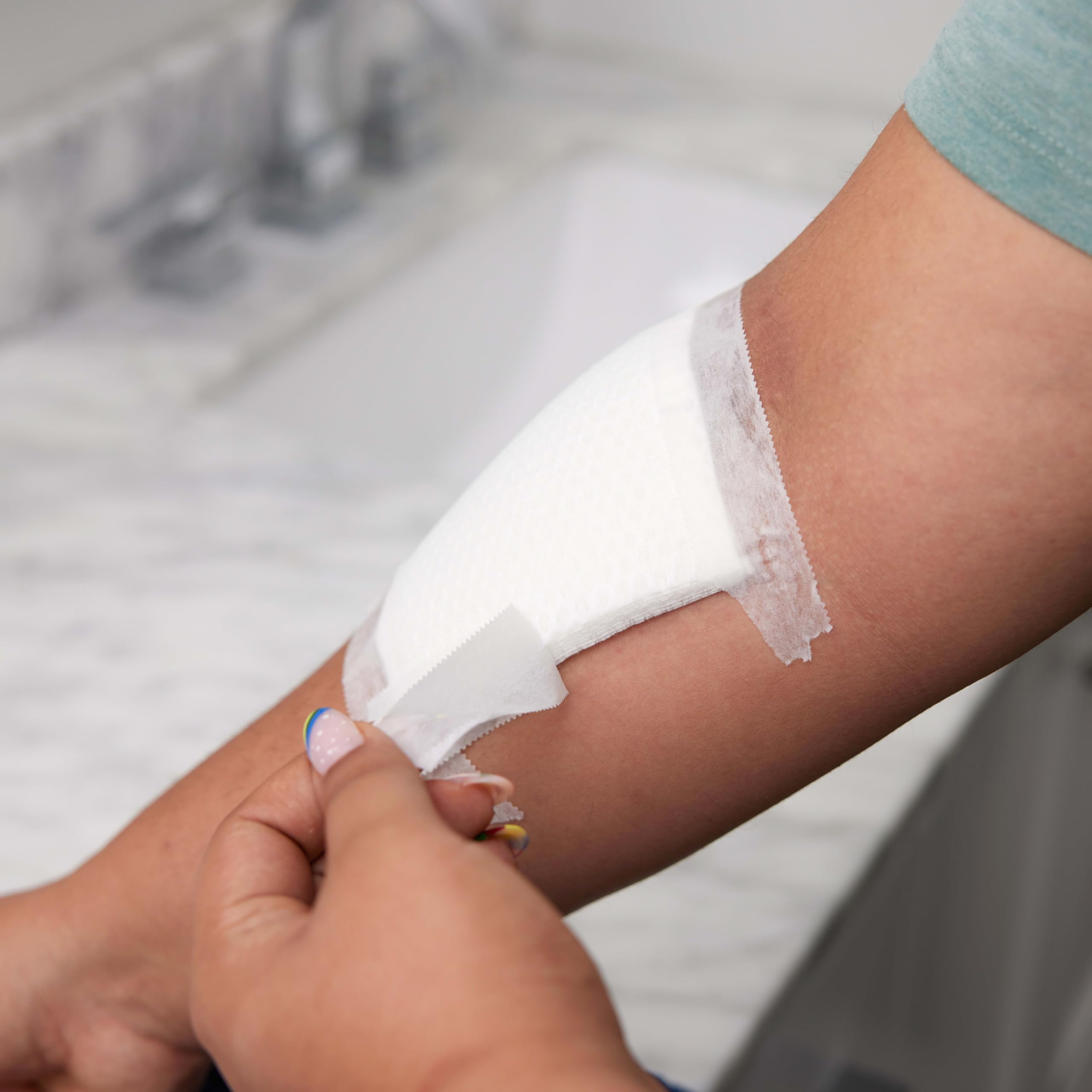 Close-up of eight-layer soft cushioning on Band-Aid Cushion-Care gauze pad