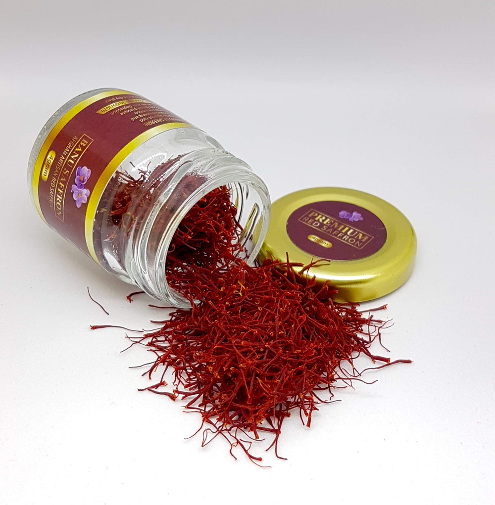 Banu Saffron organic saffron threads in a 1g jar closeup for aroma.