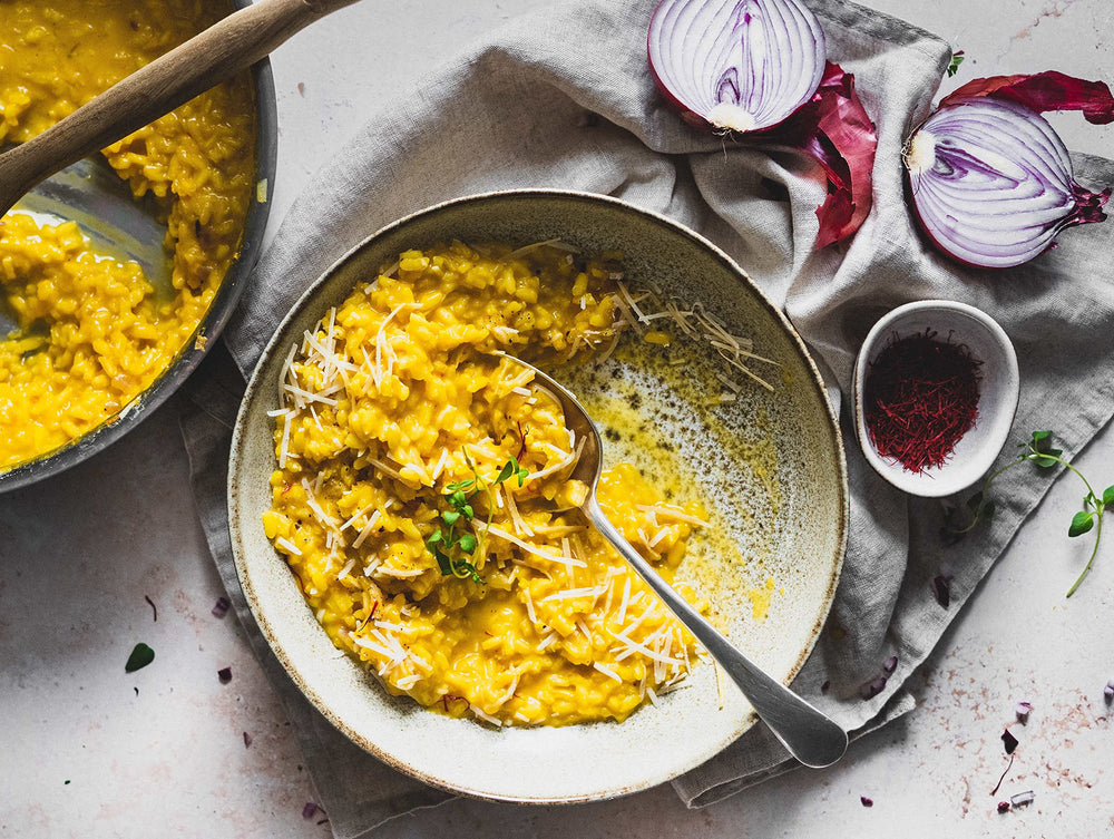 Banu Saffron rice paella dish closeup shows vibrant threads enhancing color.