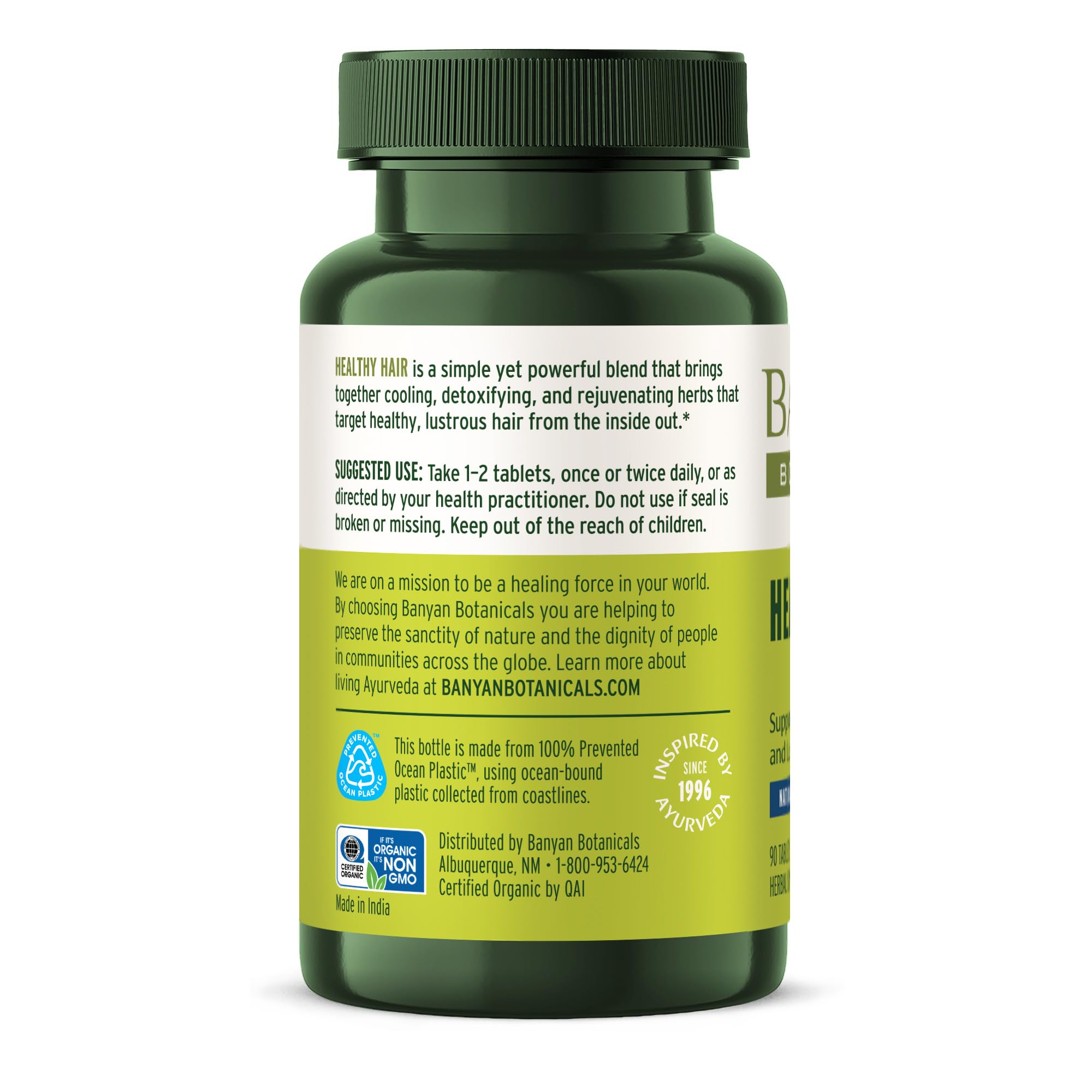 Banyan Botanicals capsules in hand for on the go.