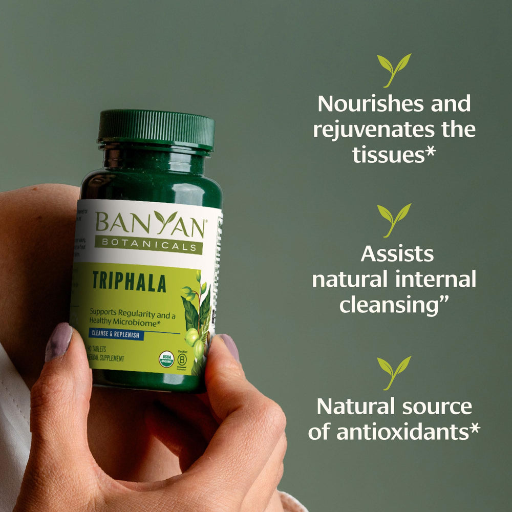 Banyan Botanicals Triphala tablets bottle label closeup emphasizes USDA Organic quality.