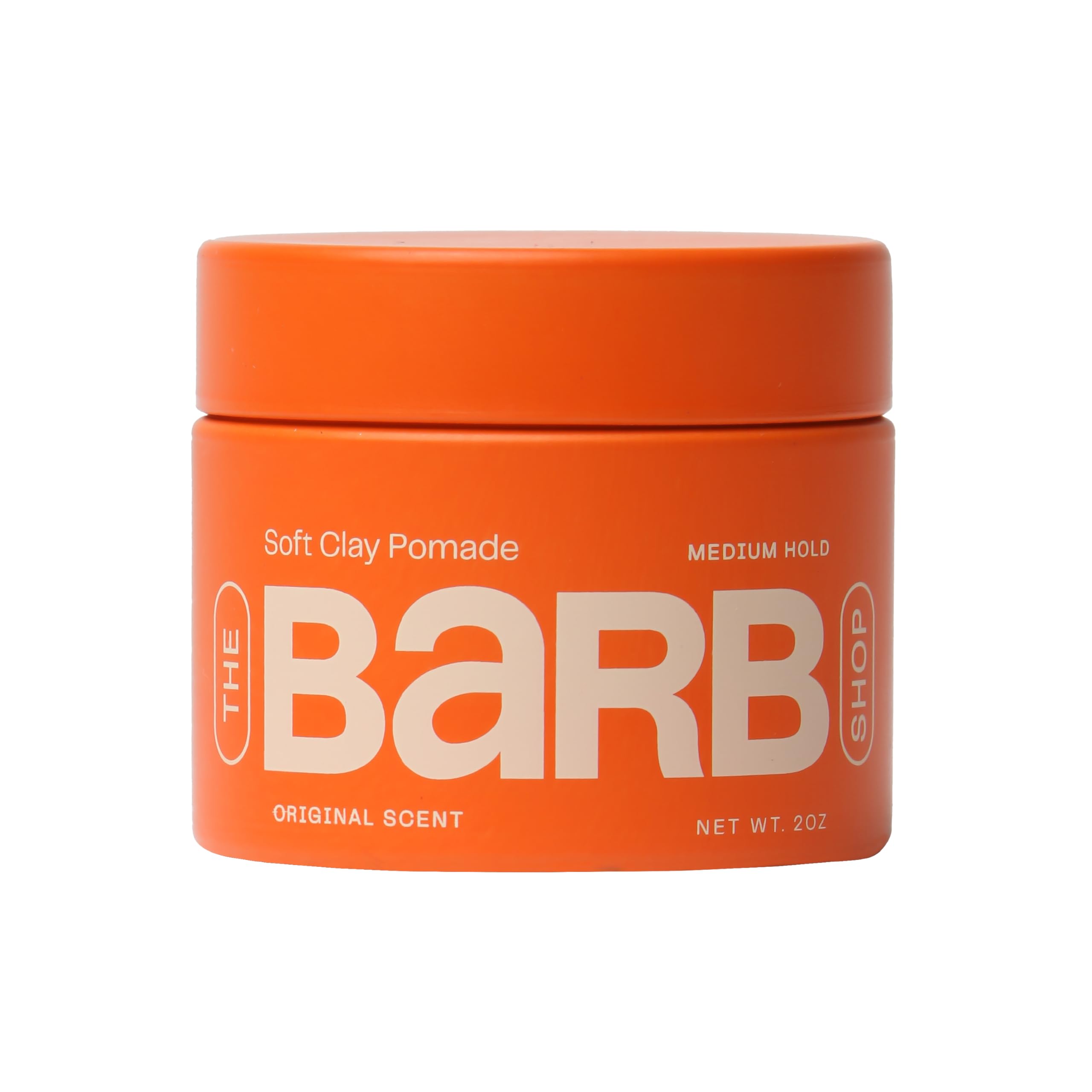 The Barb Shop Barb Soft Clay Pomade bottle close-up showing packaging and original scent for daily styling.
