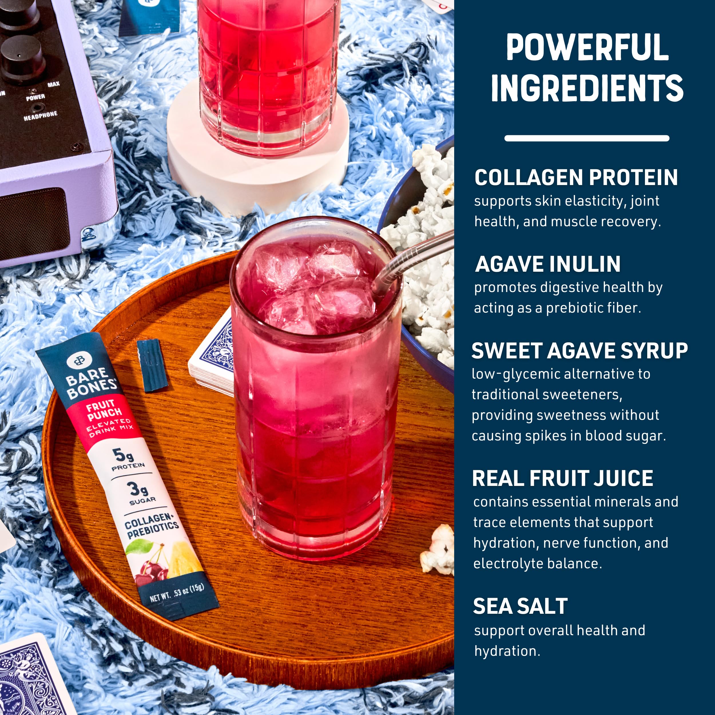 Bare Bones Fruit Punch glass with fresh fruit garnish for a flavorful refreshment.