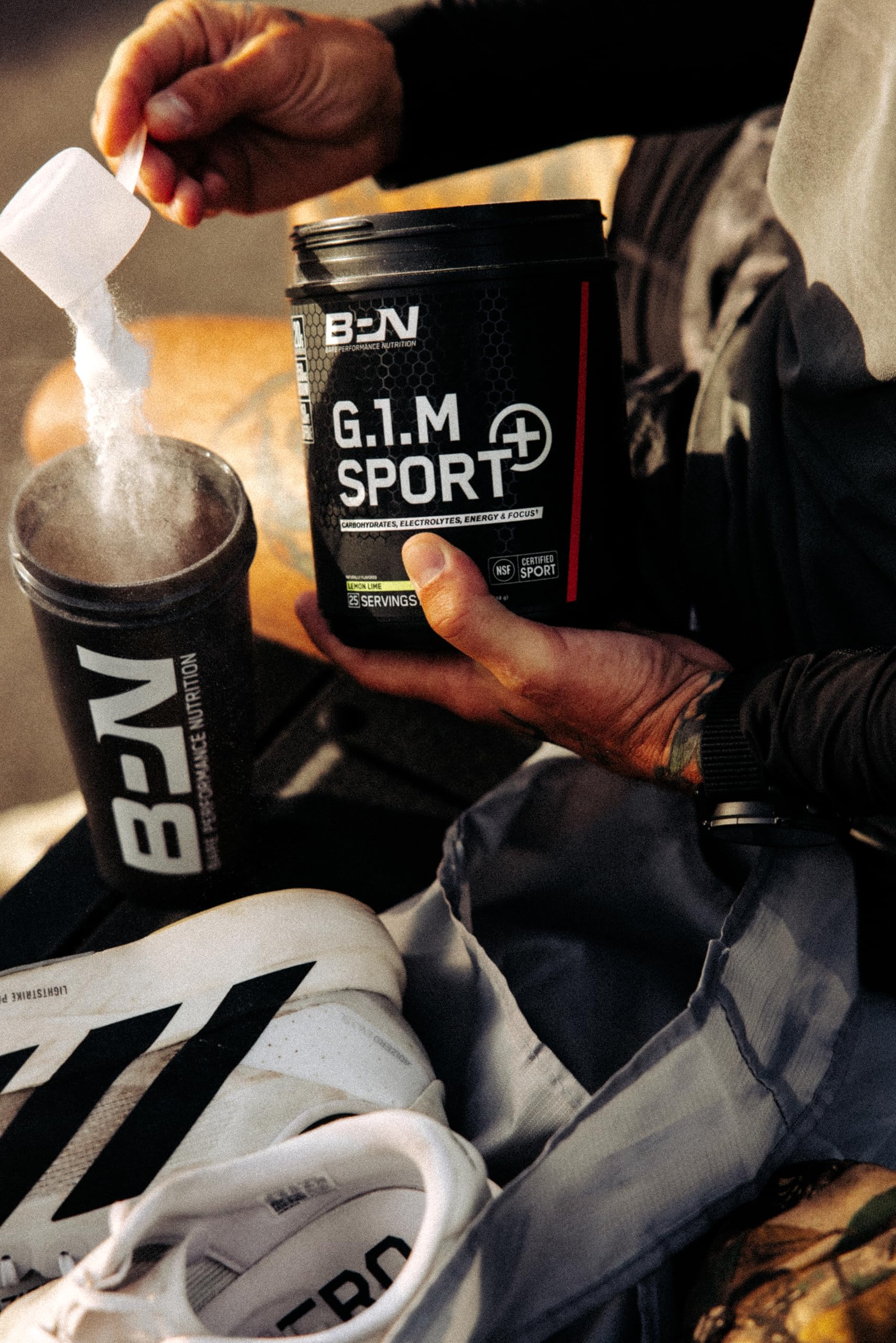 Athlete using G1M Sport+ before training for focus and energy