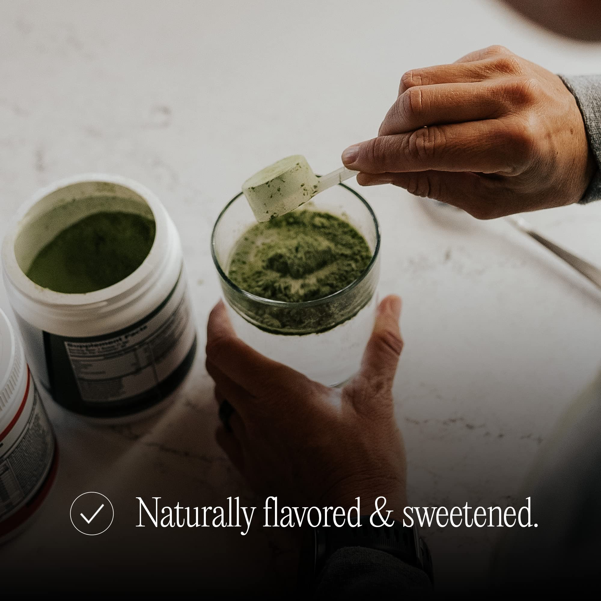 BARE PERFORMANCE NUTRITION Strong Greens bottle close-up with Informed Sport certified quality.