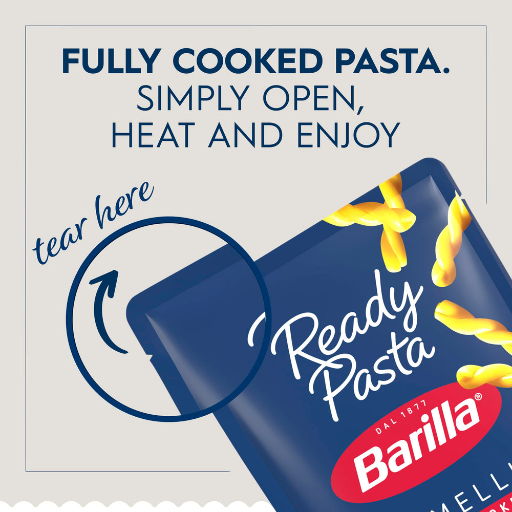 Barilla Ready Pasta Gemelli pouch open, heat and serve with toppings.