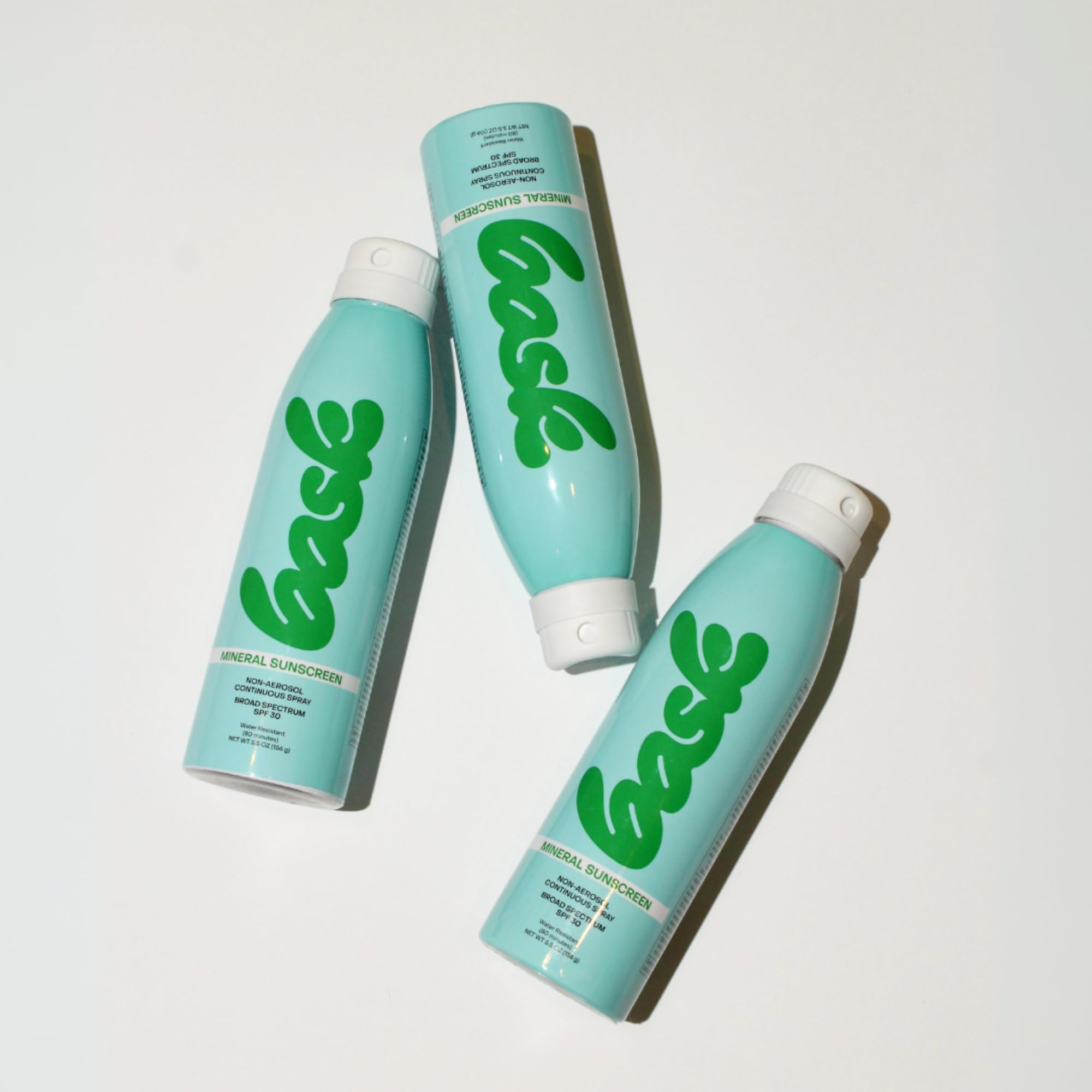 Texture close-up showing fast-absorbing finish on skin with Bask SPF30