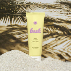 Bask Suncare SPF 50 close-up bottle highlighting non-greasy finish and quick absorption
