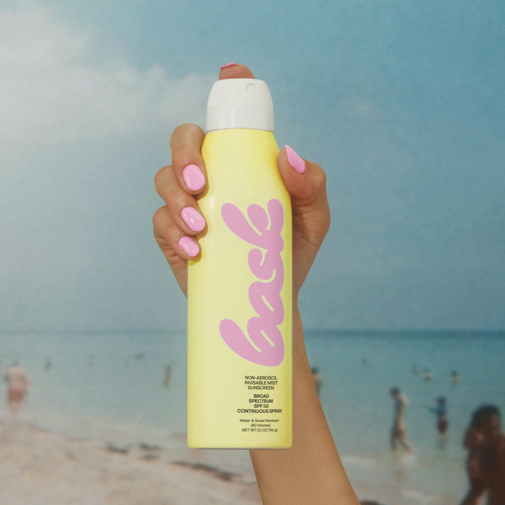 Bask Suncare bottle with vanilla coconut fragrance during sunscreen routine.