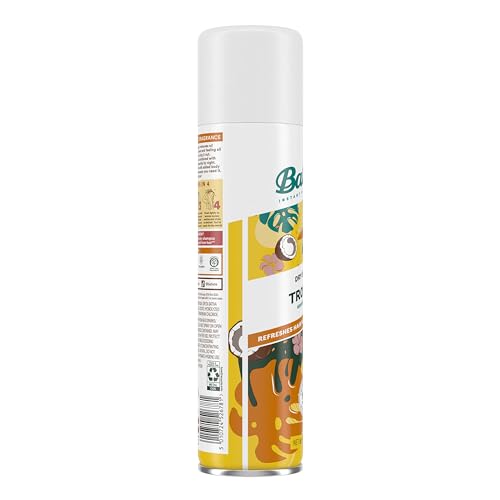Batiste Tropical dry shampoo in hand ready to spray