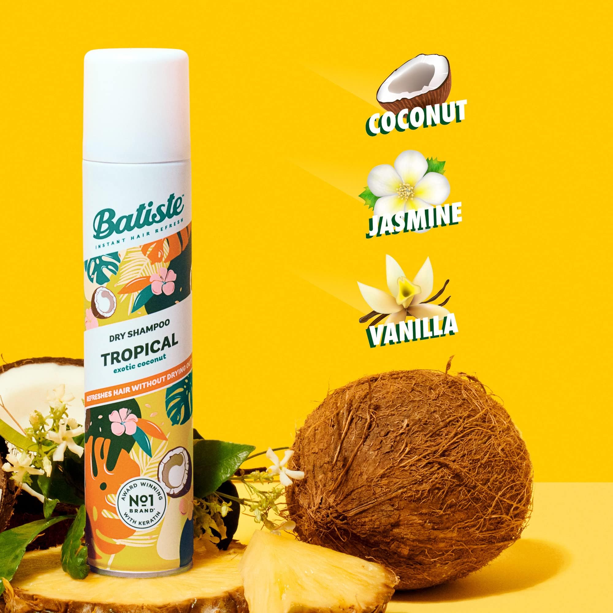 Batiste Tropical dry shampoo spray action applied to roots