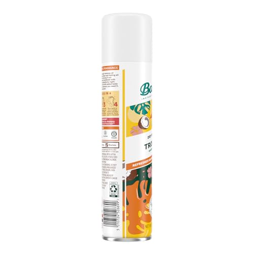 Batiste Tropical Dry Shampoo spray being applied to roots for refresh.