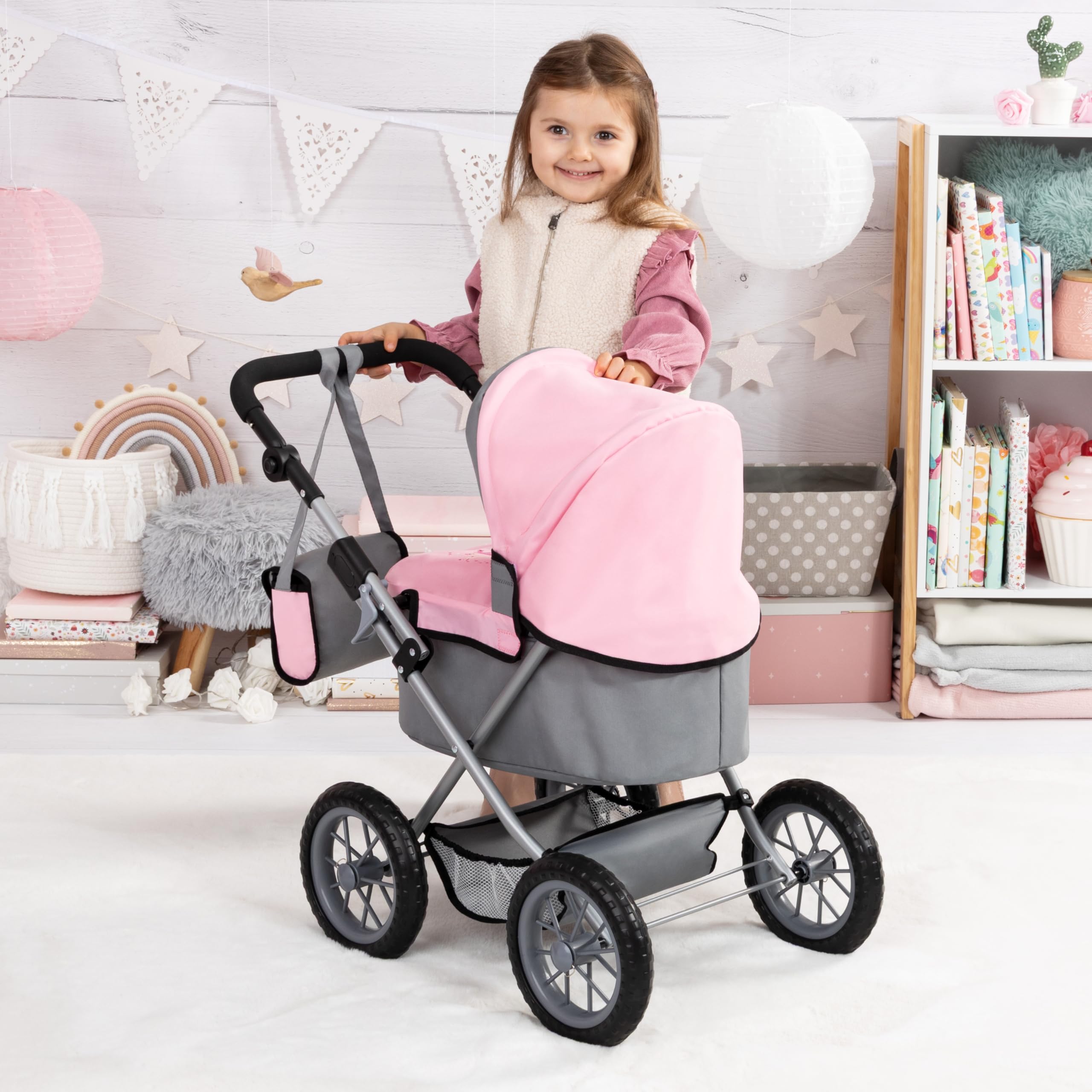 Bayer Trendy pram includes diaper bag for realistic role-play.