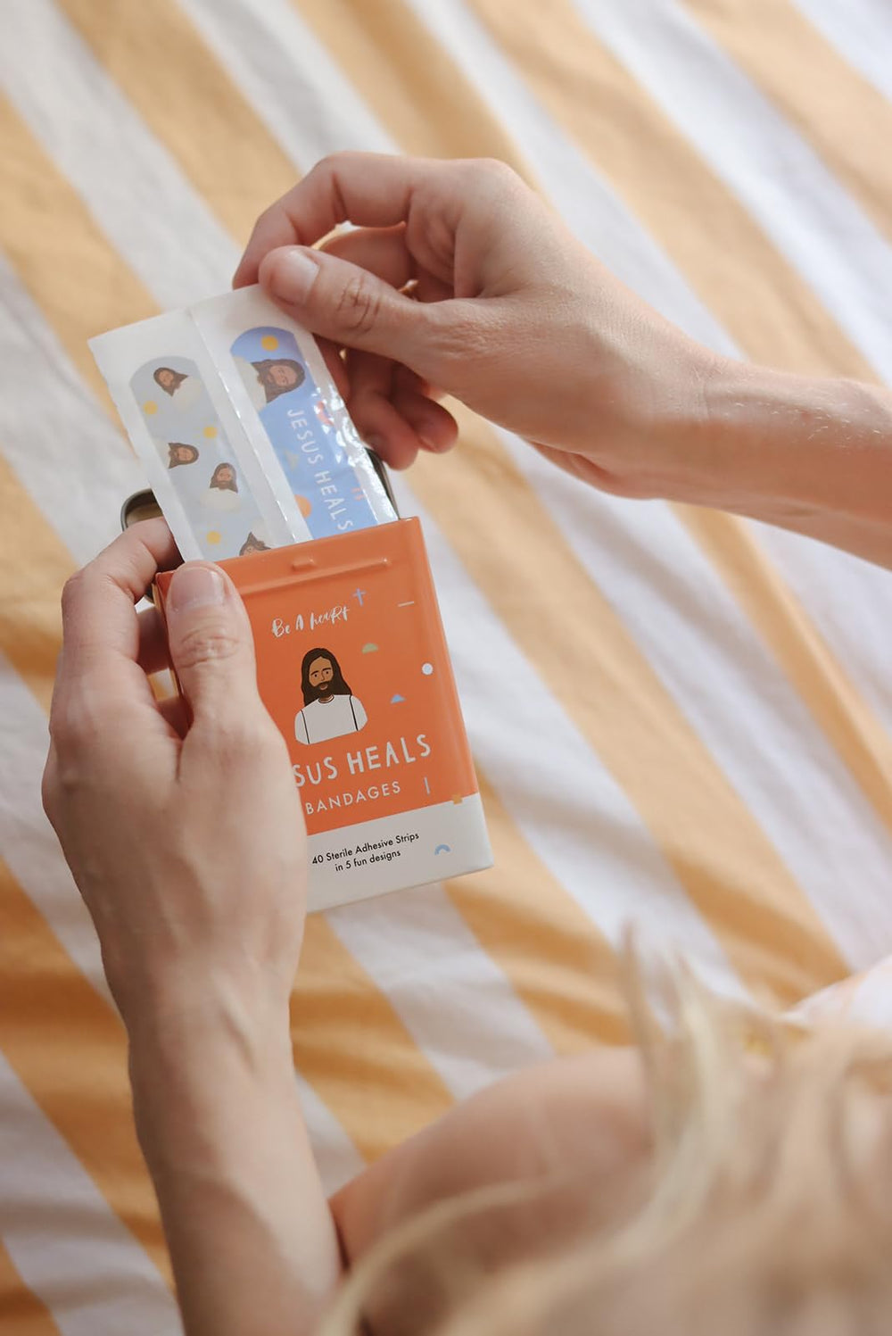 Be A Heart tin stores bandages and doubles as kid-friendly storage