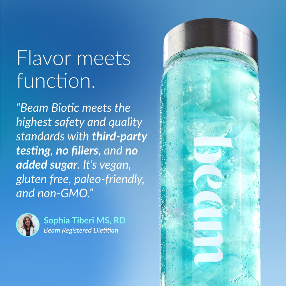 Glass of blue raspberry probiotic drink ready to enjoy.