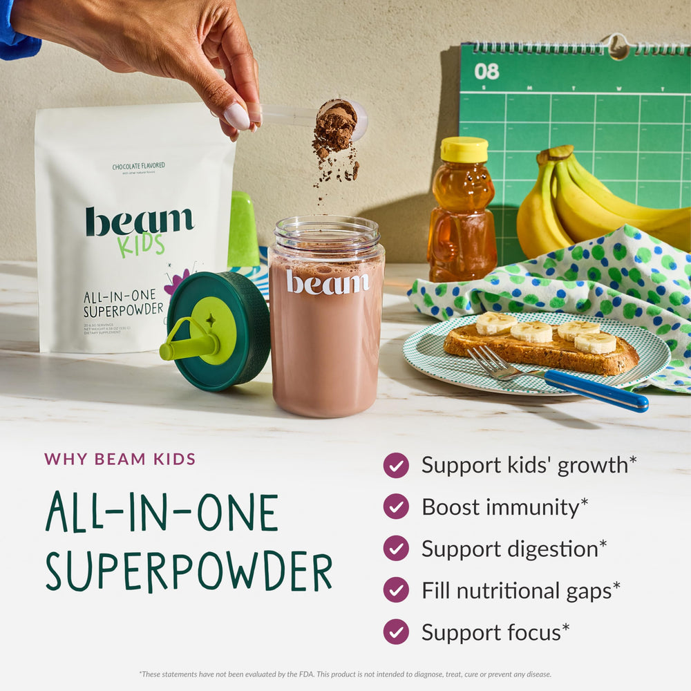 Beam Kids Multivitamin Powder chocolate flavor stirred into milk.