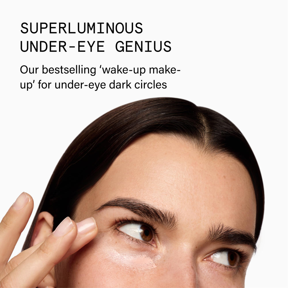 Beauty Pie Superluminous Under-Eye Genius Corrector swatch on skin showing brightening effect.