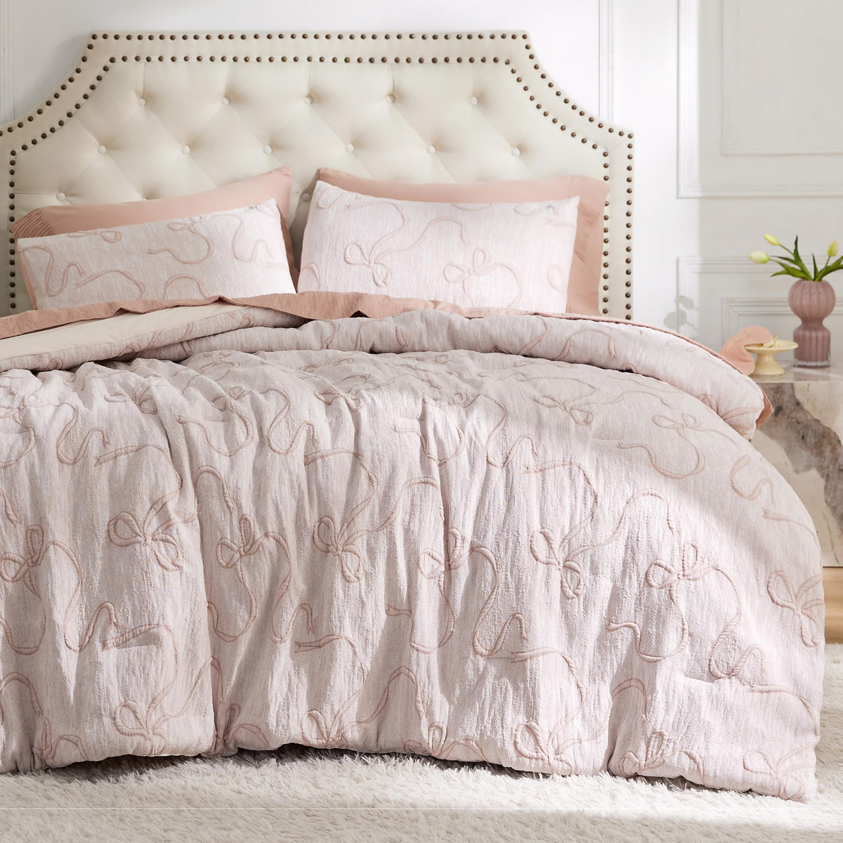 Bedsure pink comforter set queen with butterfly bow close-up showing premium texture