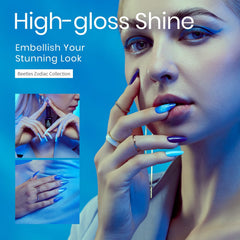 Beetles aqua-blue gel polish on nails for elegant nail art.