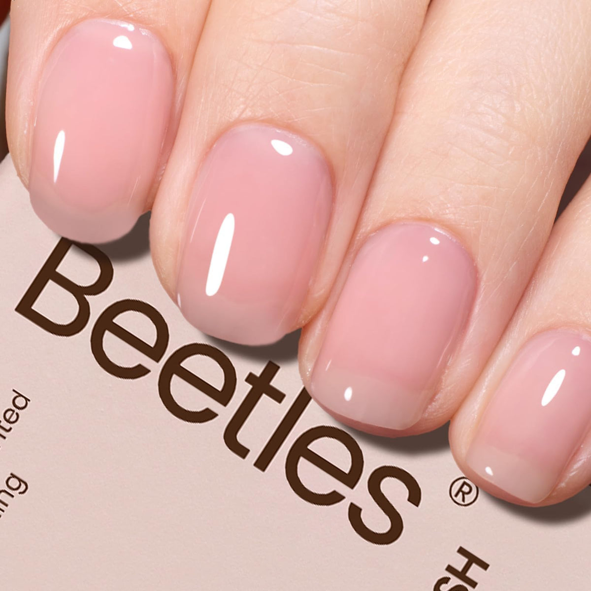 Be Beetles Nude Pink Gel Polish bottle and brush for easy, smooth application.