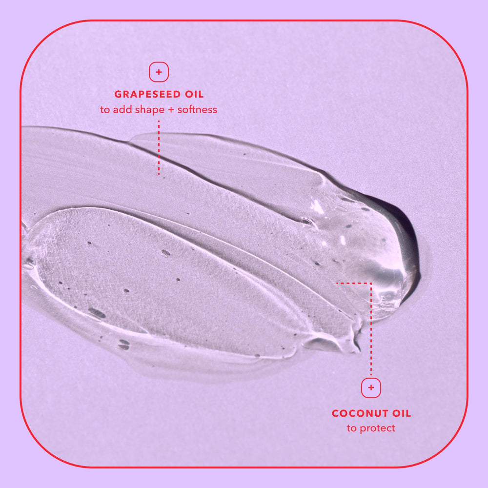 Shampoo texture closeup shows creamy lather for defined curls with BEING INC.