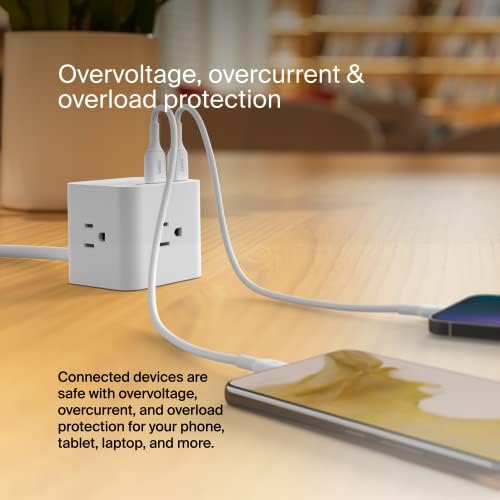 Belkin desk setup with the power cube powering multiple devices.
