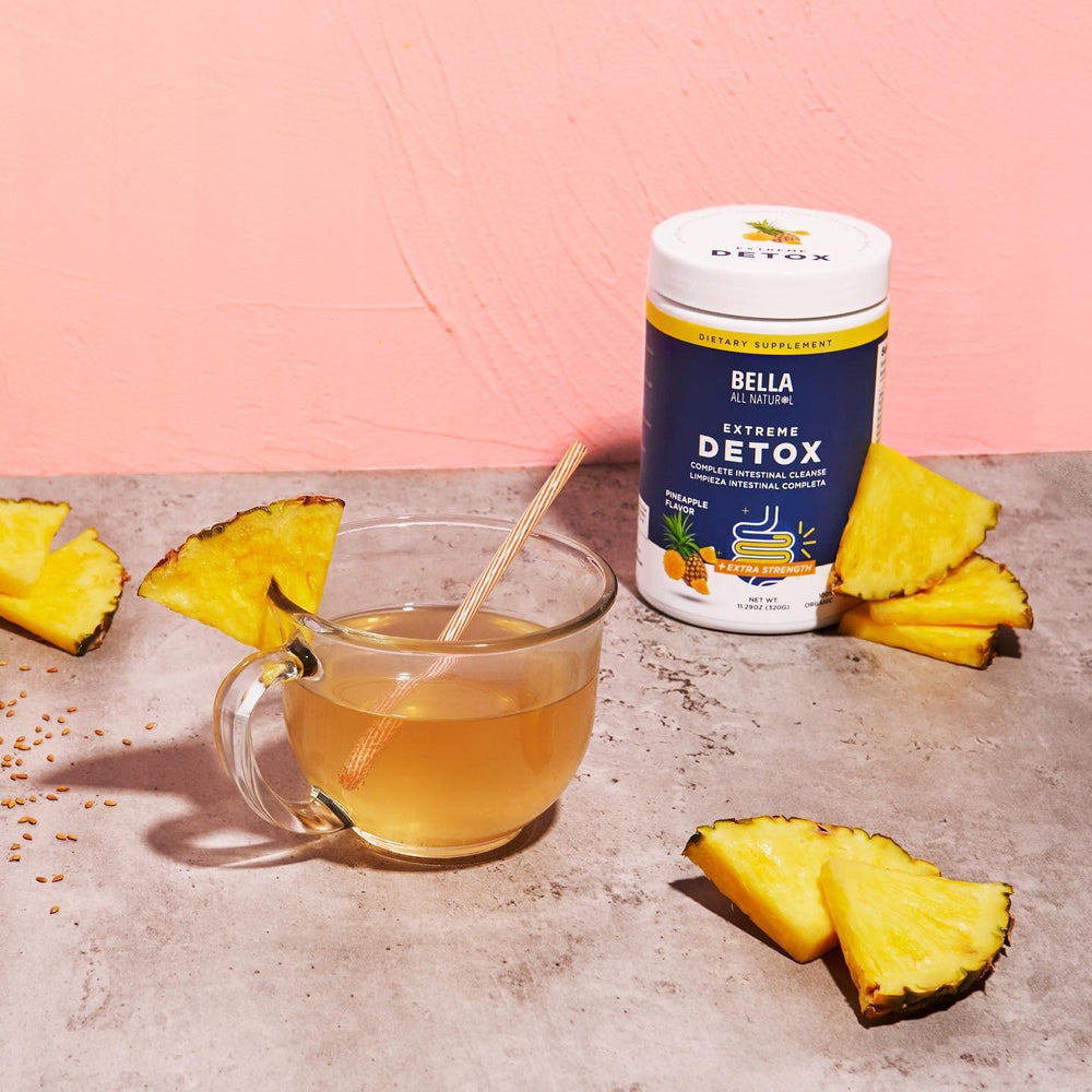 Bella All Natural Extreme Detox Pineapple morning routine setup with a glass.