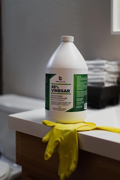 Close-up of Belle Chemical label showing concentrated formula for efficient cleaning.