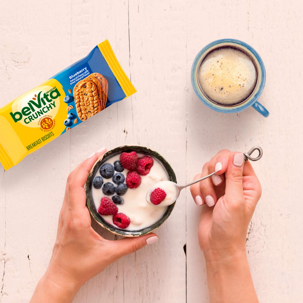 Box of Belvita Blueberry Breakfast Biscuits highlighting eight packs for convenience