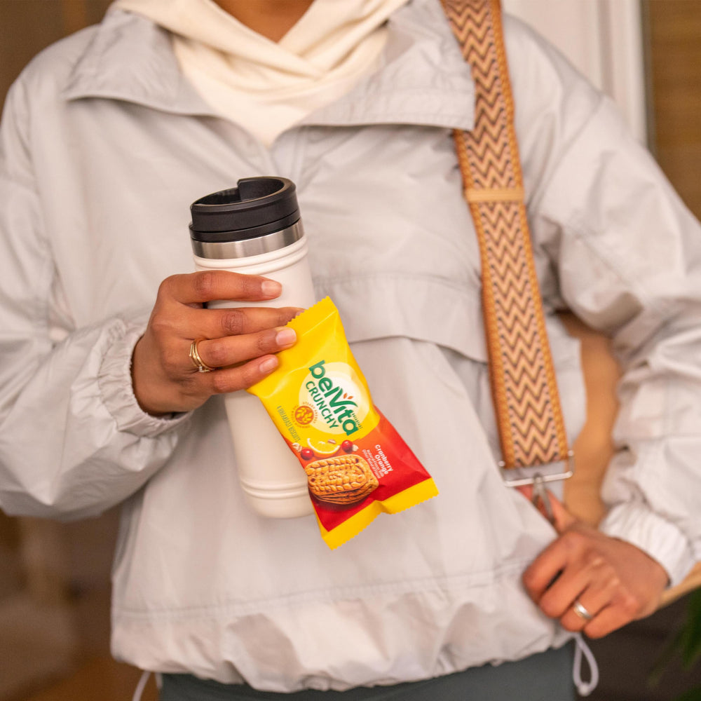Belvita Cranberry Orange biscuits nutrition facts panel visible.