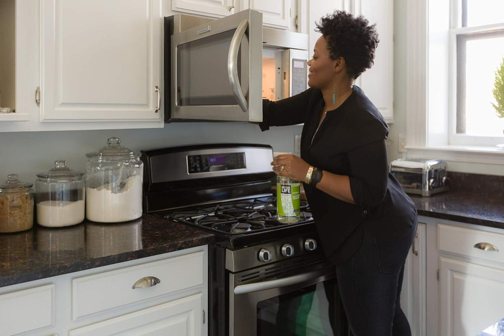 Eco-friendly Better Life formula bottle highlighting plant-based cleaning elements