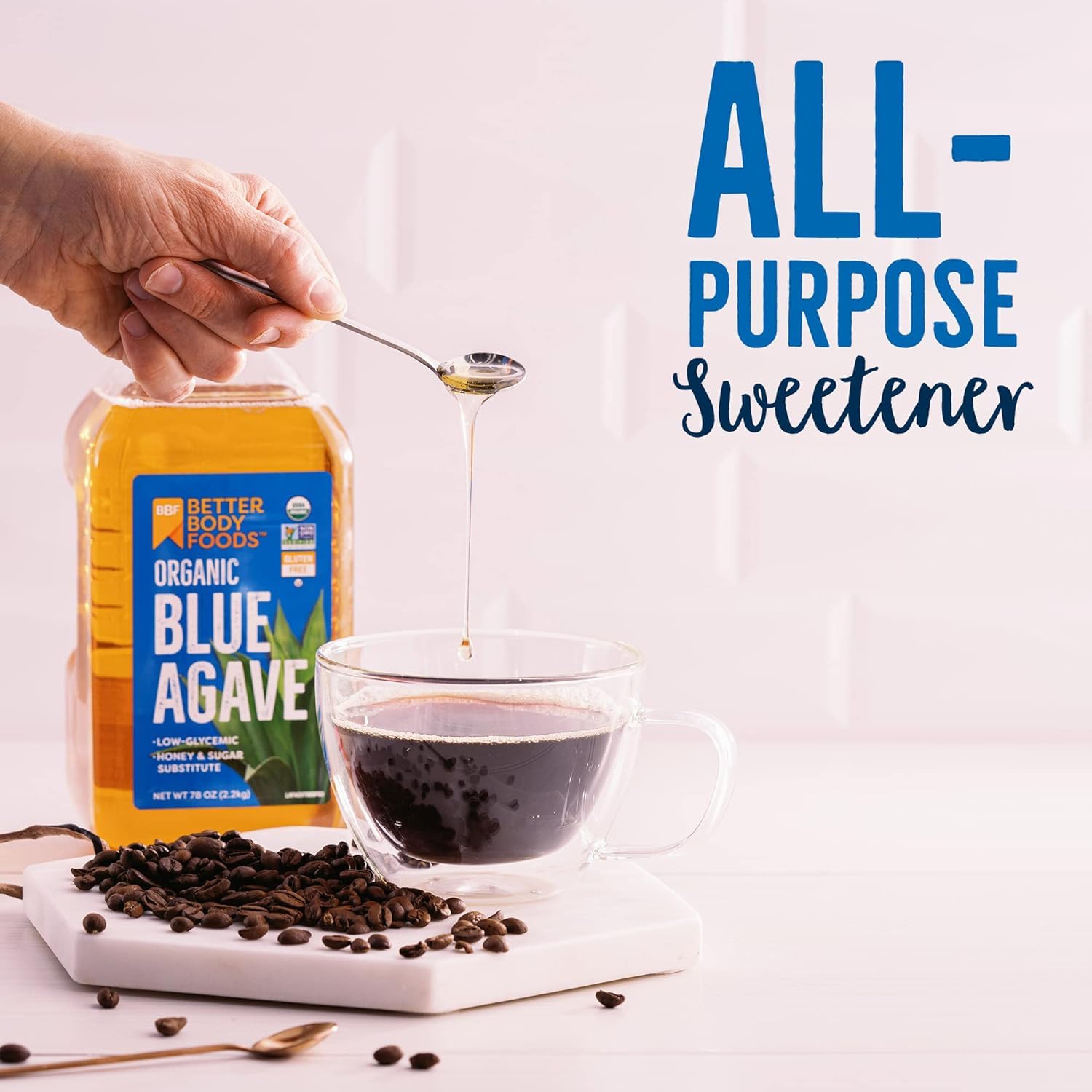 BetterBody Foods Organic Blue Agave Nectar bottle in coffee or tea