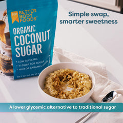 BetterBody Foods measuring scoop over organic coconut sugar ready for a spoonful in recipes.