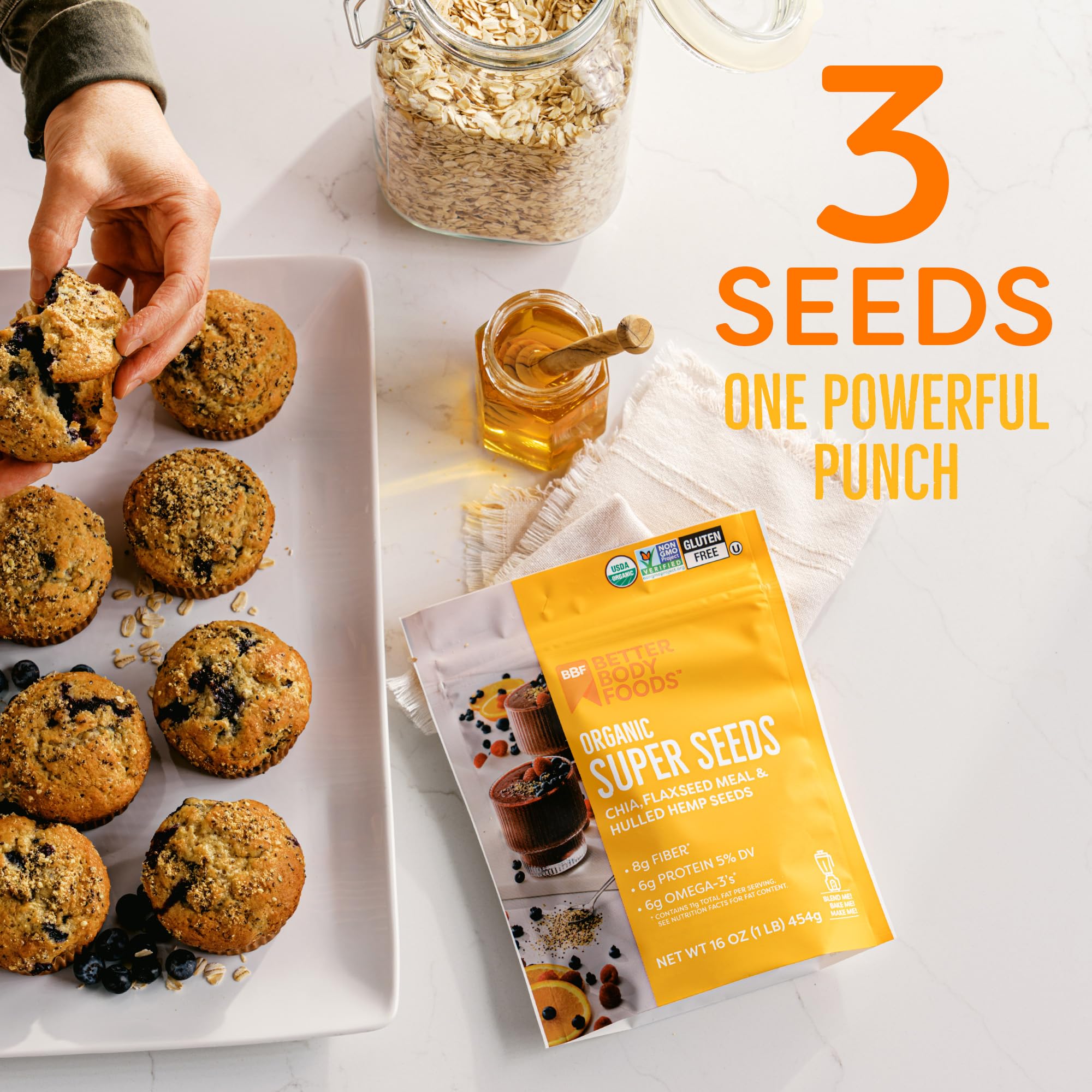 BetterBody Foods Organic Super Seeds being poured into a smoothie for added texture.