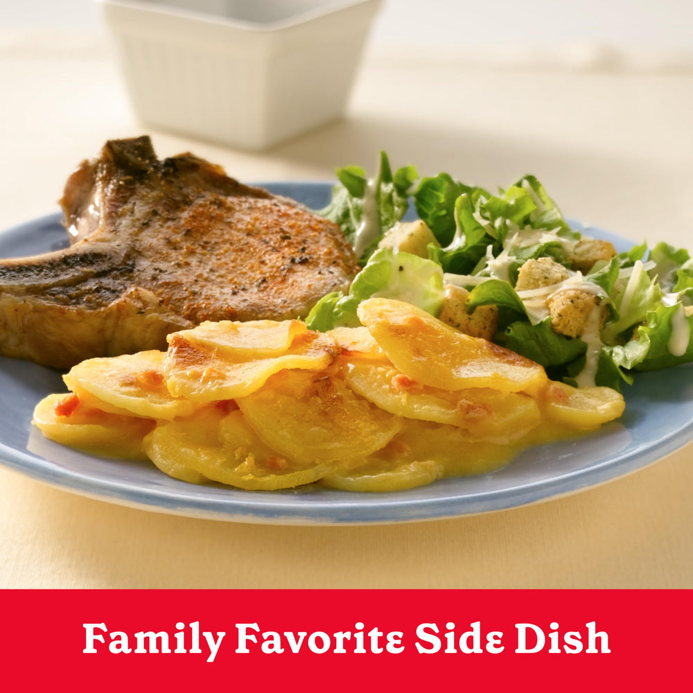 Betty Crocker Cheddar and Bacon Potatoes on a cozy family dinner table.