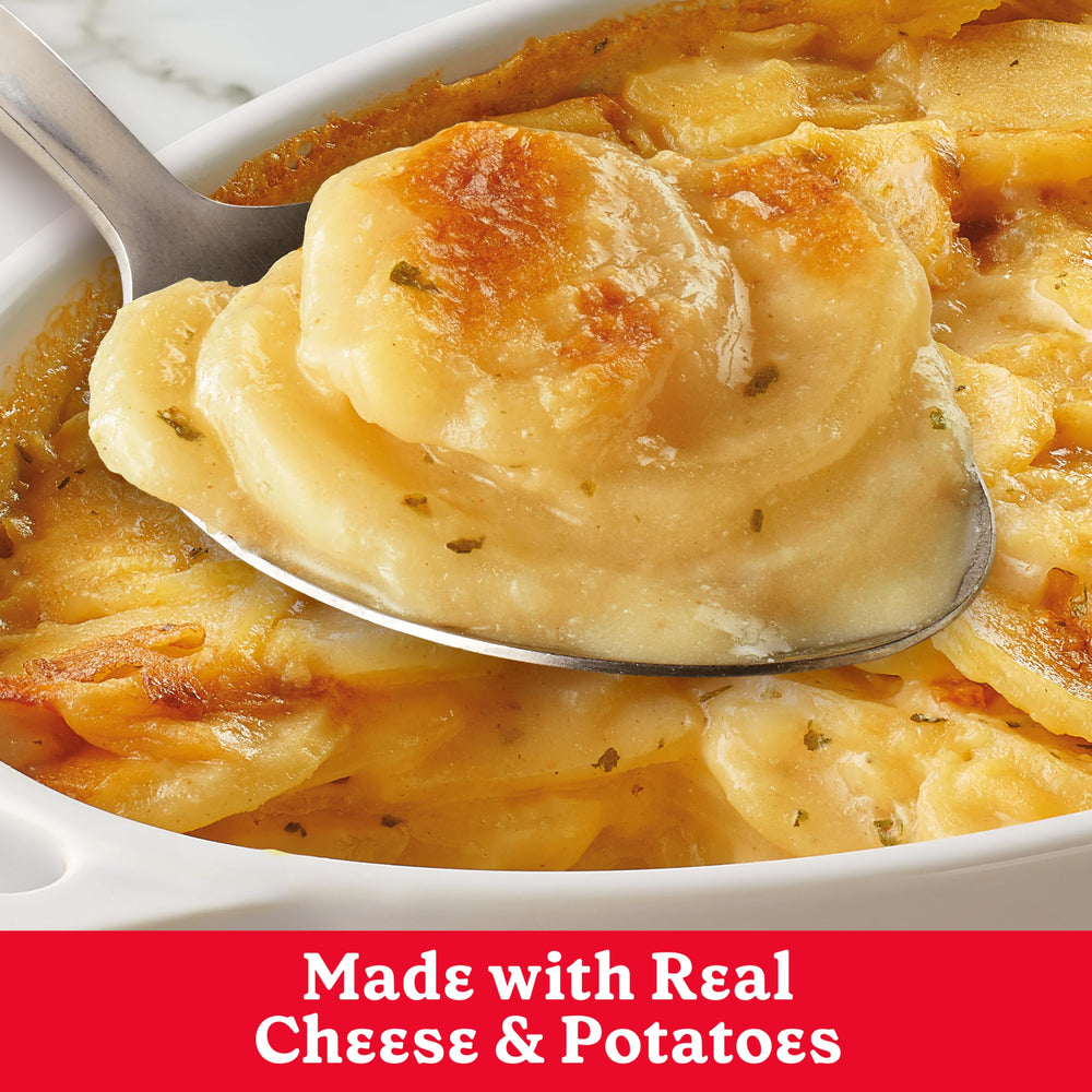 Betty Crocker Cheesy Scalloped Potatoes close up of cheese sauce texture.