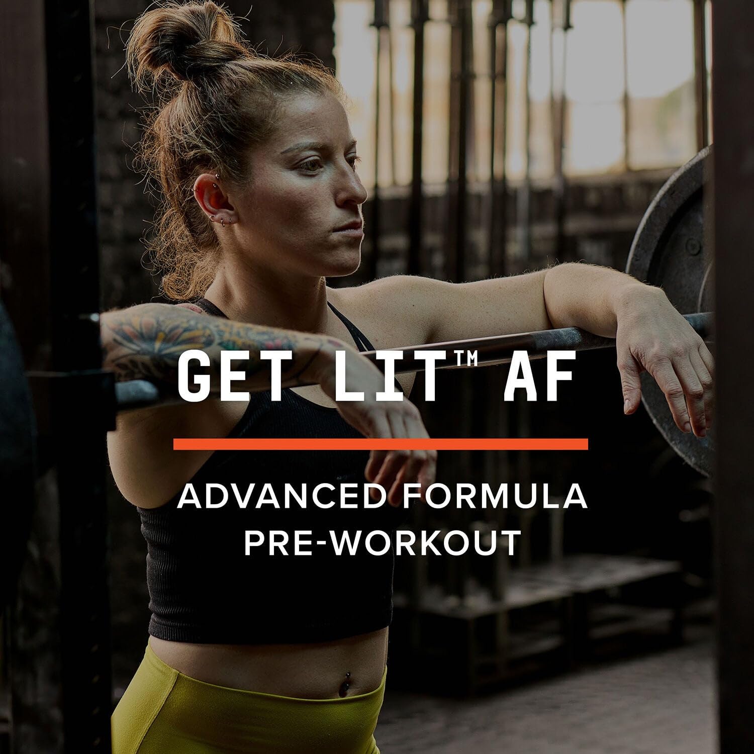 BEYOND RAW LIT scoop of powder ready for a high-energy workout.