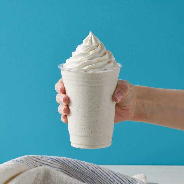 Big Train Frappé mug with steam highlights a warm, indulgent vanilla drink.
