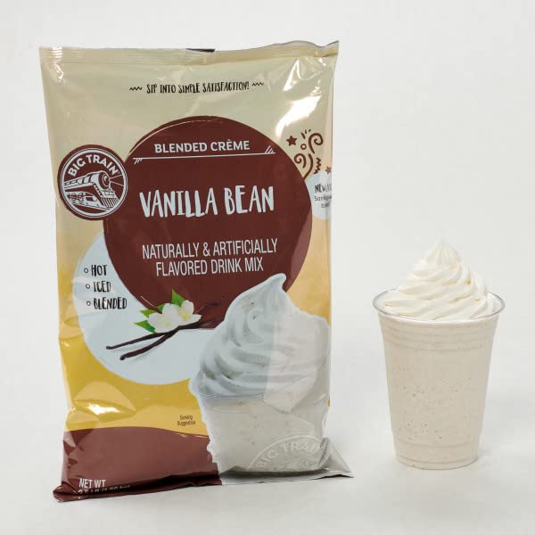 Big Train Frappé pour in a clear glass showcasing creamy vanilla texture.