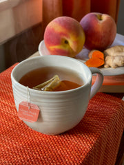 Bigelow Ginger Peach Turmeric tea 18-count pack for versatile hot or iced tea.