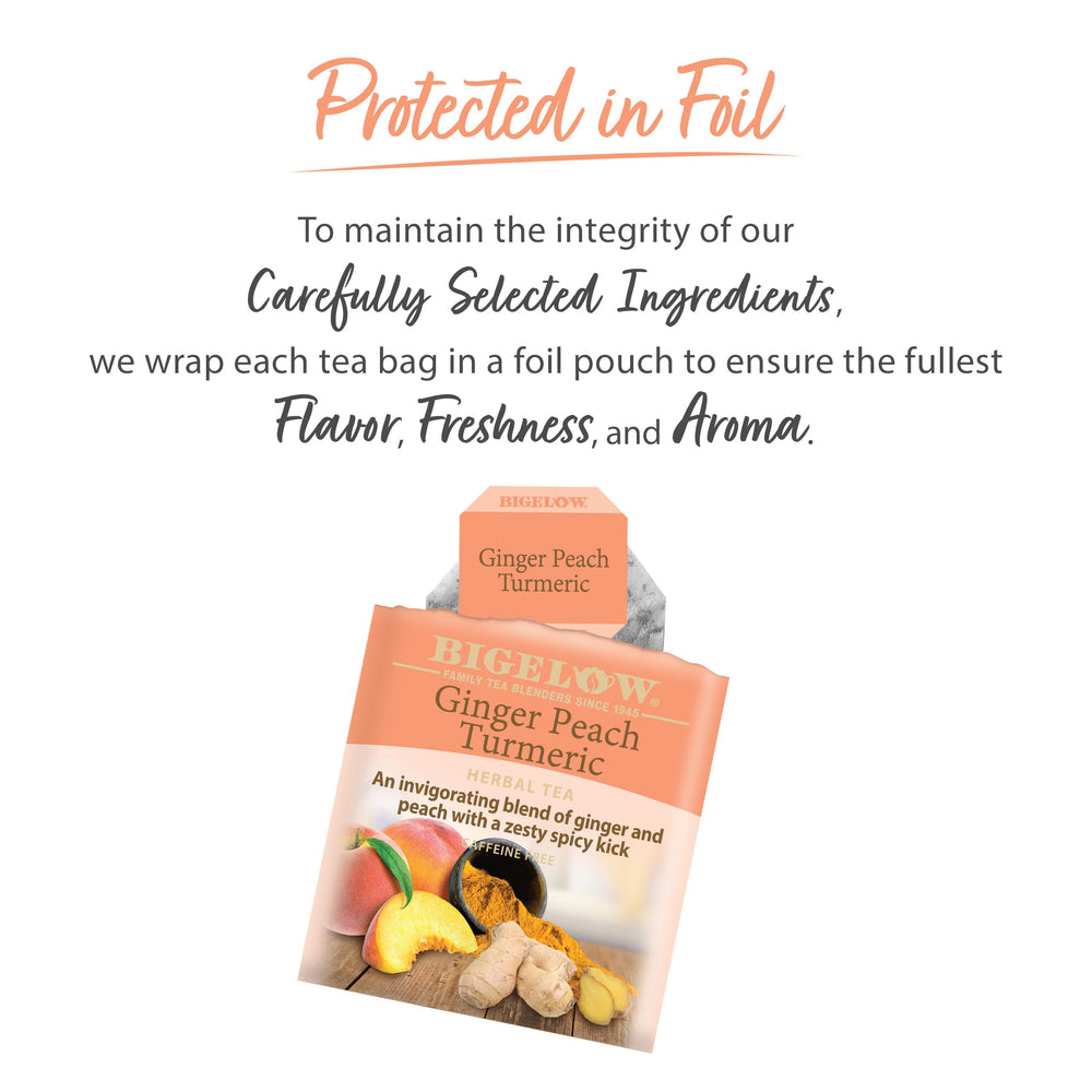Prepared mug with amber tea and inviting aroma from Bigelow Ginger Peach Turmeric.