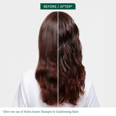 Applying Biolage Hydra Source Conditioning Balm to wet hair for detangling and softness
