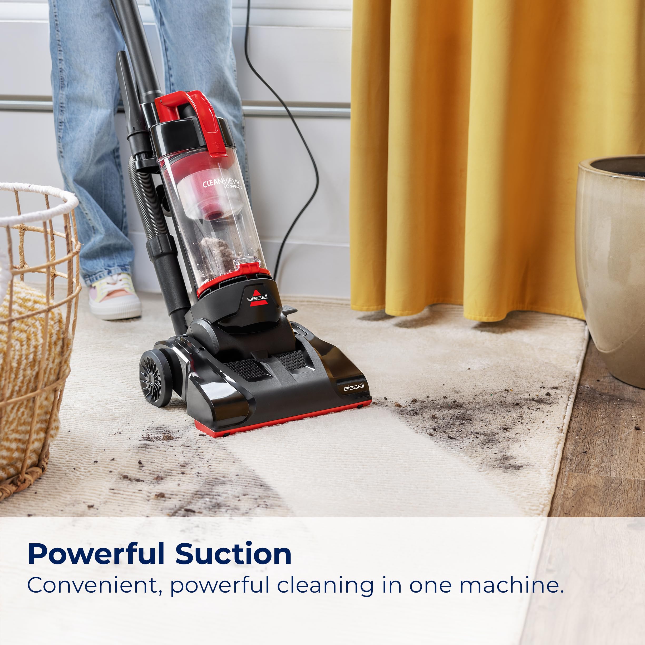 Bissell CleanView Compact easy-empty dirt container release.