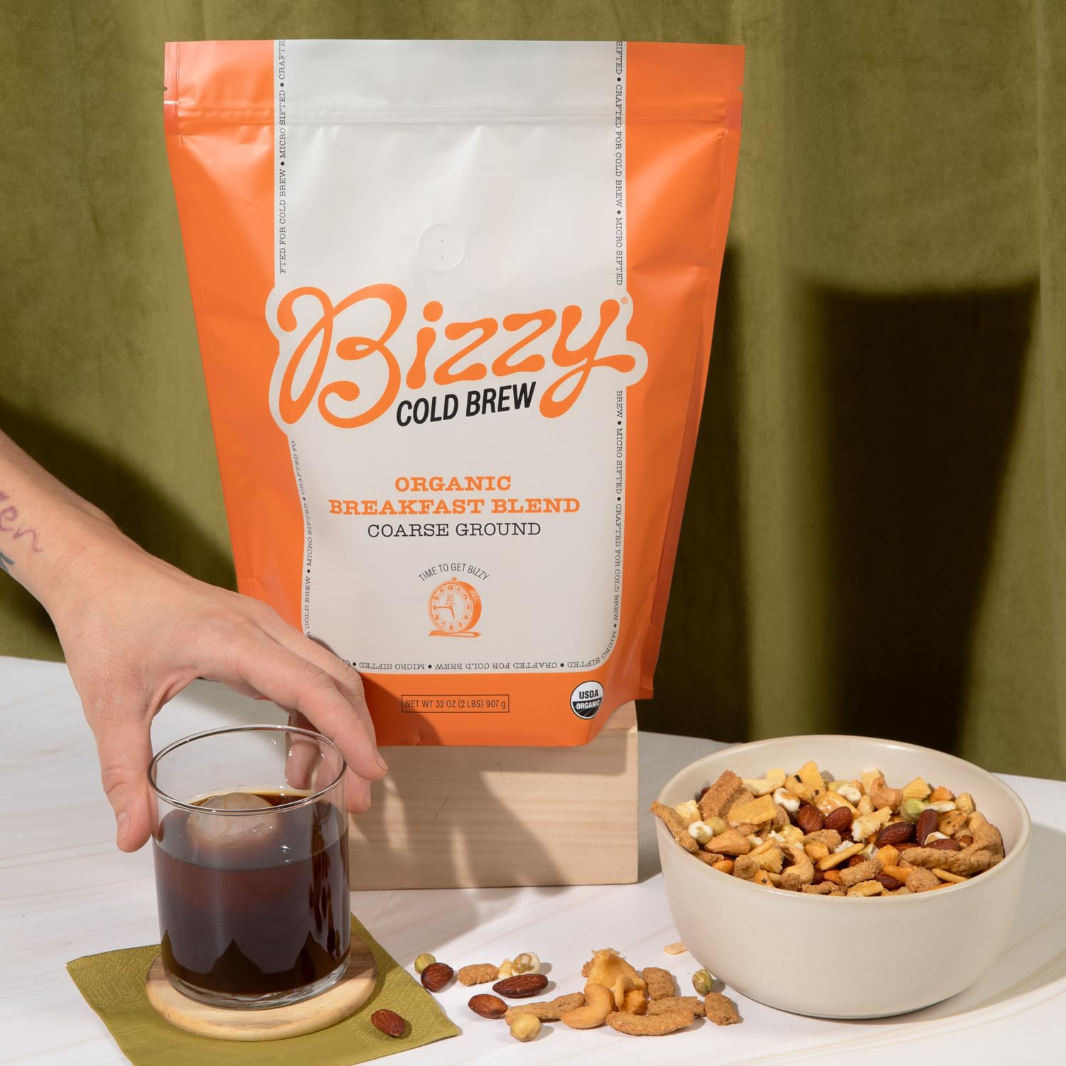 Closeup of Bizzy Organic Cold Brew coarse-ground bag highlighting premium Arabica flavor potential.
