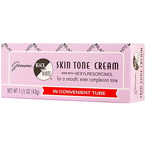 Black and White color correction cream bottle close-up, showing a smooth texture for an even skin tone.