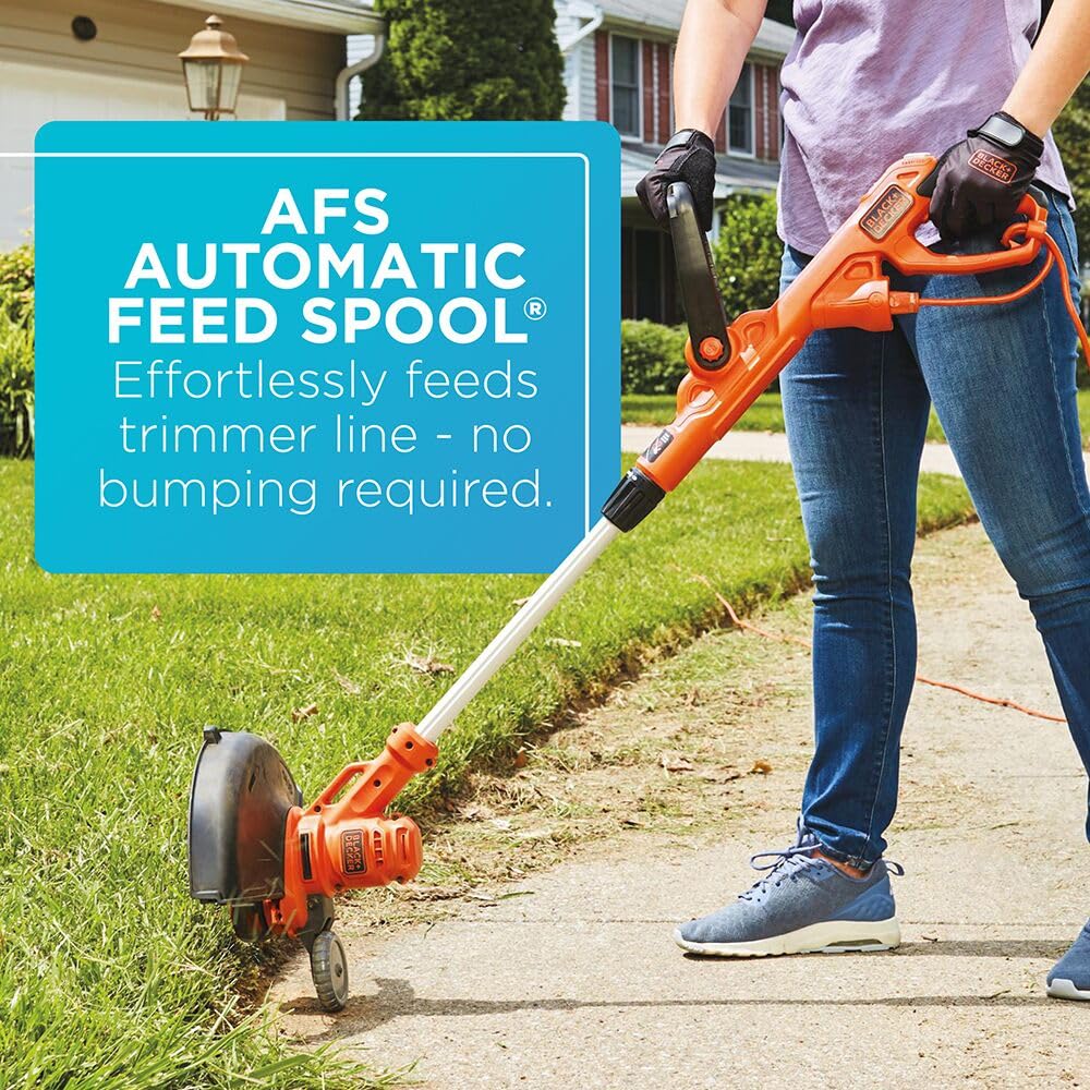 BLACK+DECKER 6.5-amp motor powering through dense growth with ease.