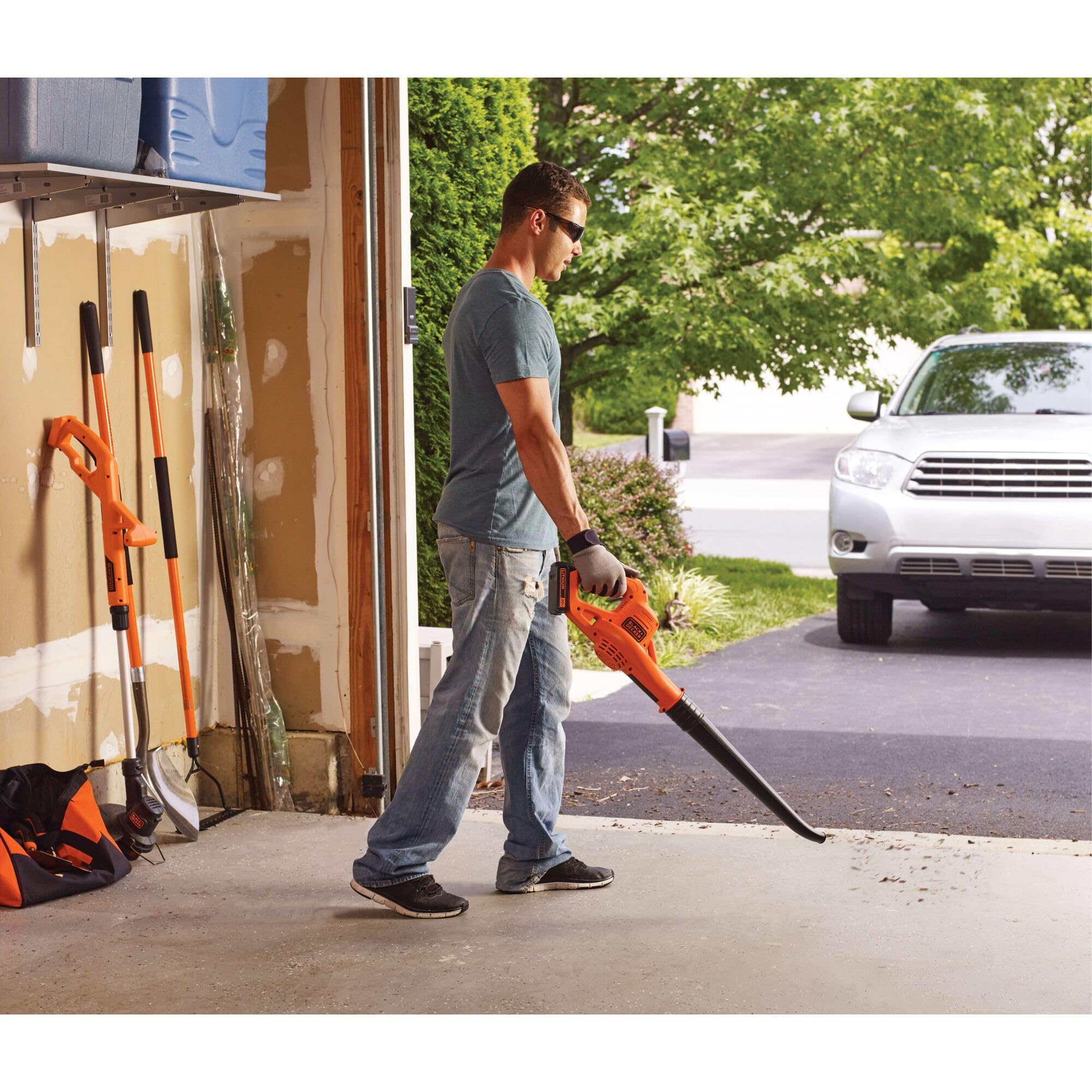 BLACK+DECKER cordless blower ideal for driveways and sidewalks cleanup.